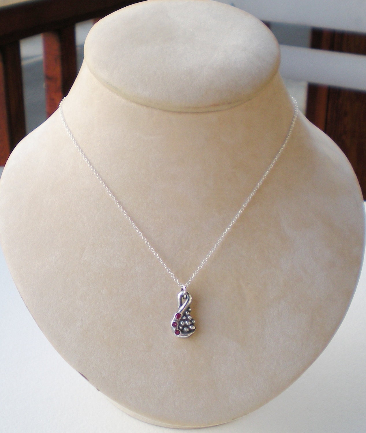 Fine solid silver natural Ruby swirl and pebble pendant