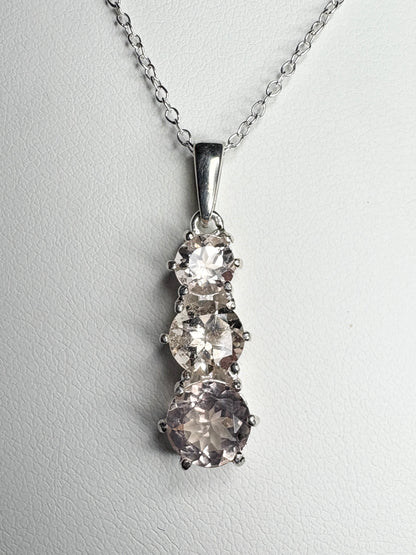 Sterling silver pendant necklace with three natural morganite stones.