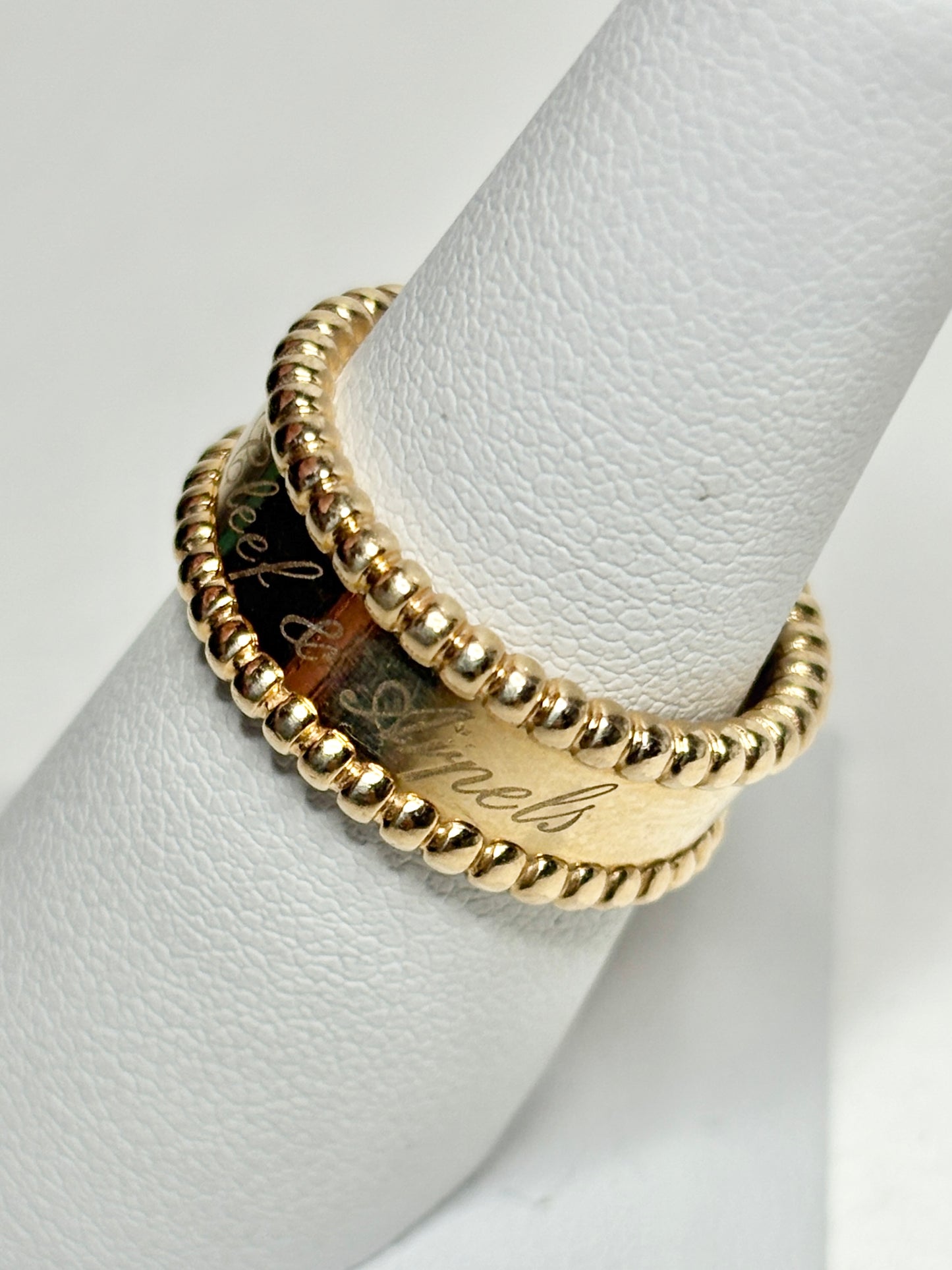 Van Cleef & Arpels Perlee Signature band ring in 18k gold.