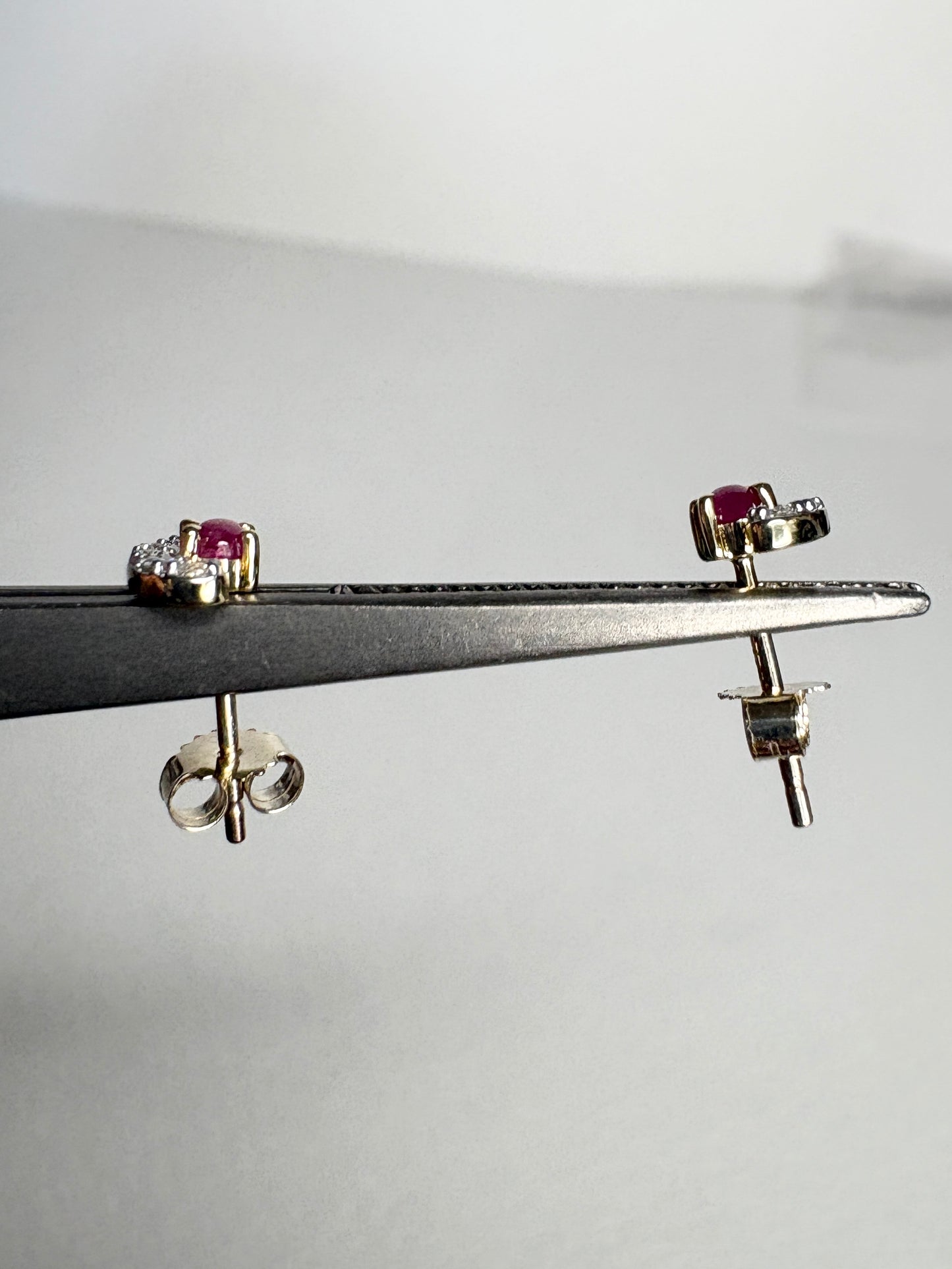 Greenland Ruby and Canadian Diamond Stud Earrings 9k Gold