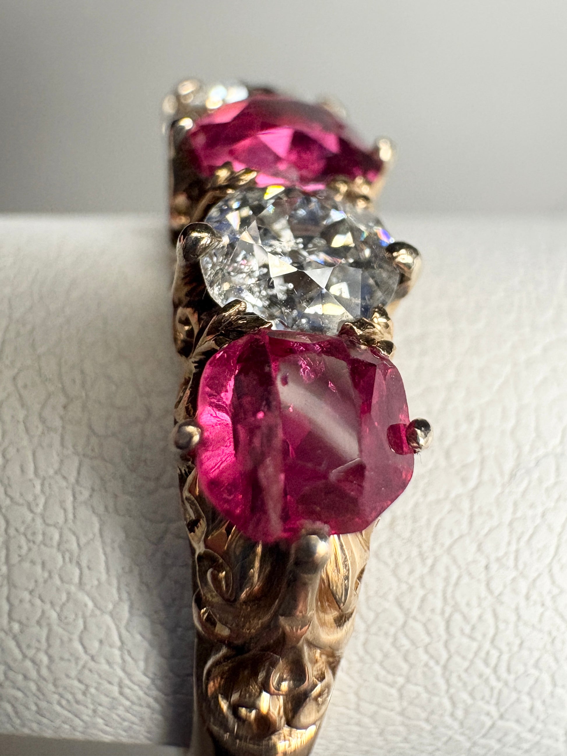 Antique 14k gold ring with red spinel and old mine cut diamonds.
