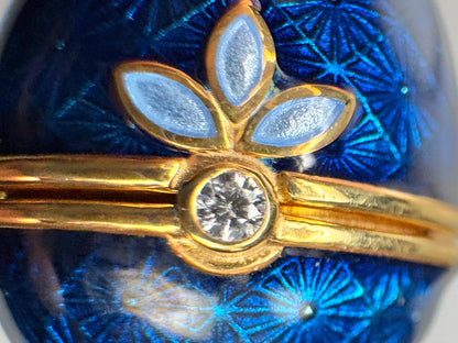 Opens. Silver. Gold Plated Blue Egg Locket with Butterfly Surprise. Diamond.