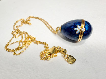 Opens. Silver. Gold Plated Blue Egg Locket with Butterfly Surprise. Diamond.