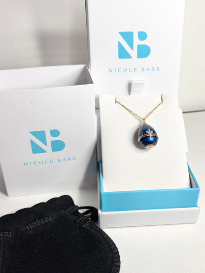 Opens. Silver. Gold Plated Blue Egg Locket with Butterfly Surprise. Diamond.