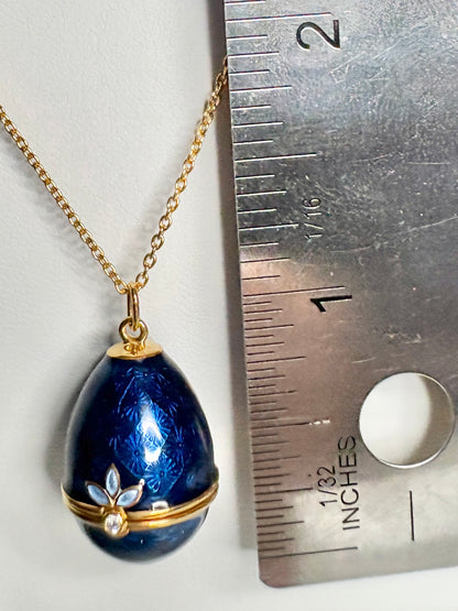 Opens. Silver. Gold Plated Blue Egg Locket with Butterfly Surprise. Diamond.