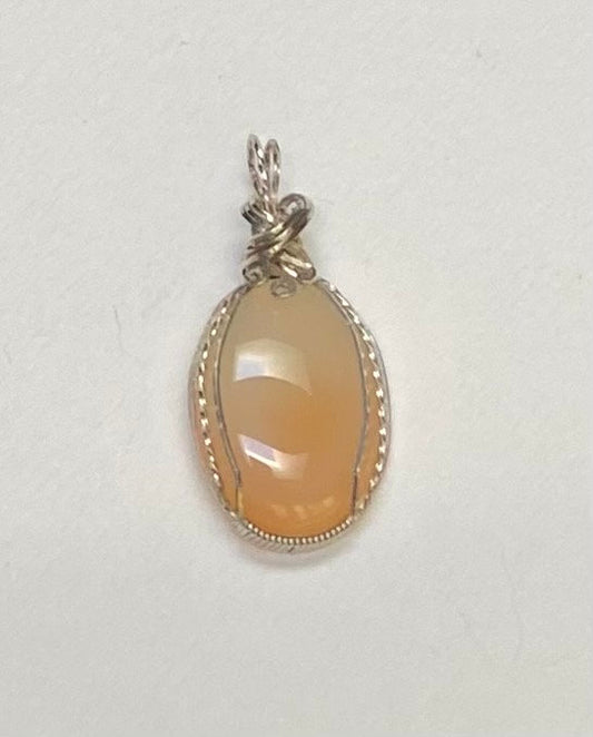 Peach Chalcedony sterling silver wire wrapped pendant