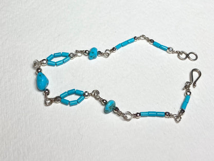 Sterling silver bracelet with Sleeping Beauty turquoise nuggets and beads.