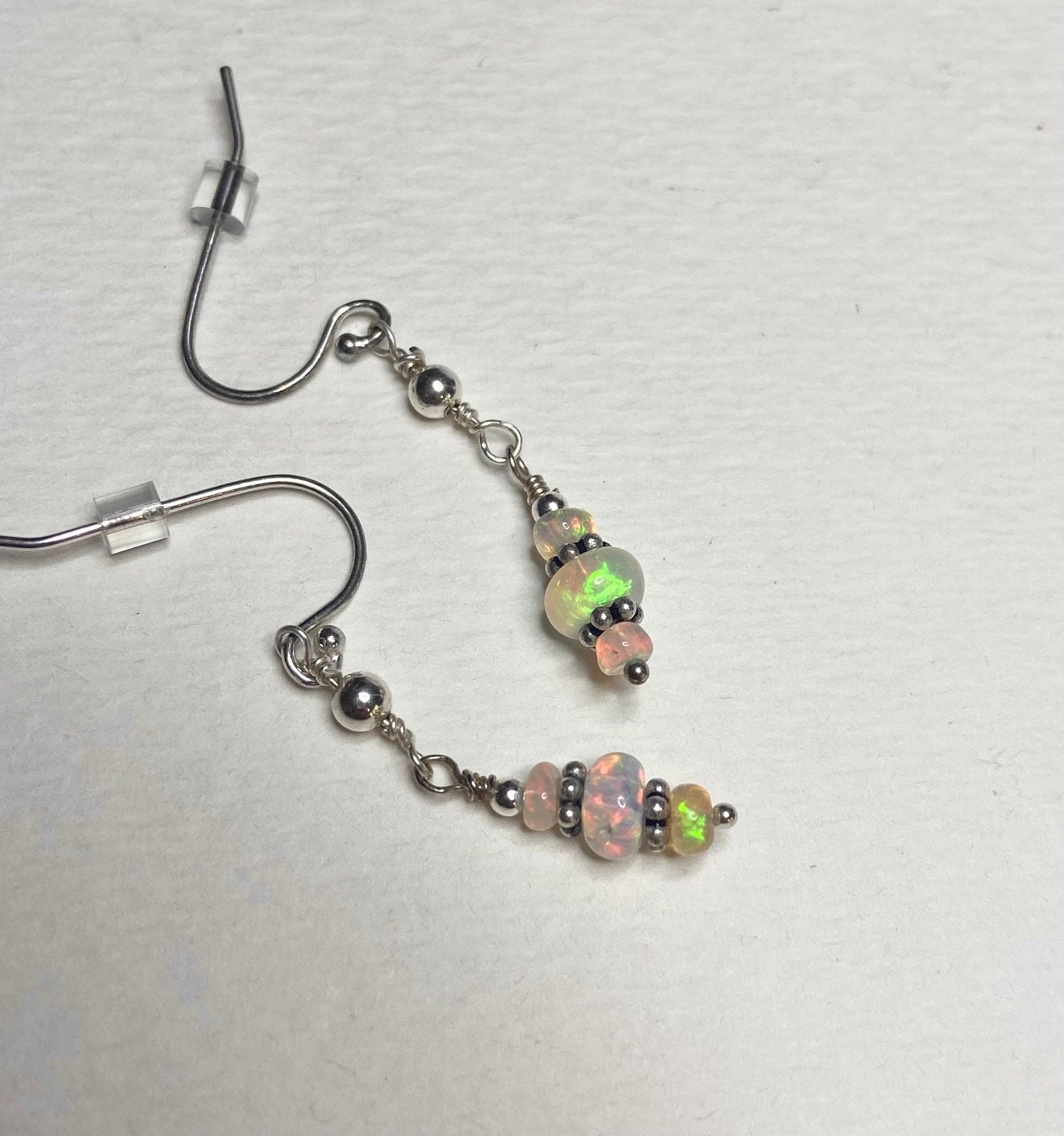 Sterling silver dangle earrings with Ethiopian Wello Opal beads.