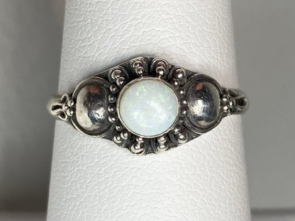 Handmade sterling silver ring with a white Australian opal.