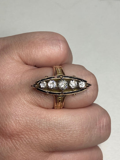 Antique Victorian navette ring with five old mine cut diamonds and black enamel.