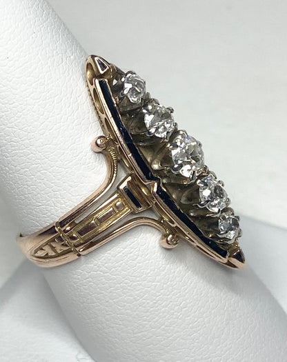 Antique Victorian navette ring with five old mine cut diamonds and black enamel.
