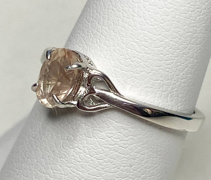 Sterling silver ring with a light peach Oregon sunstone.