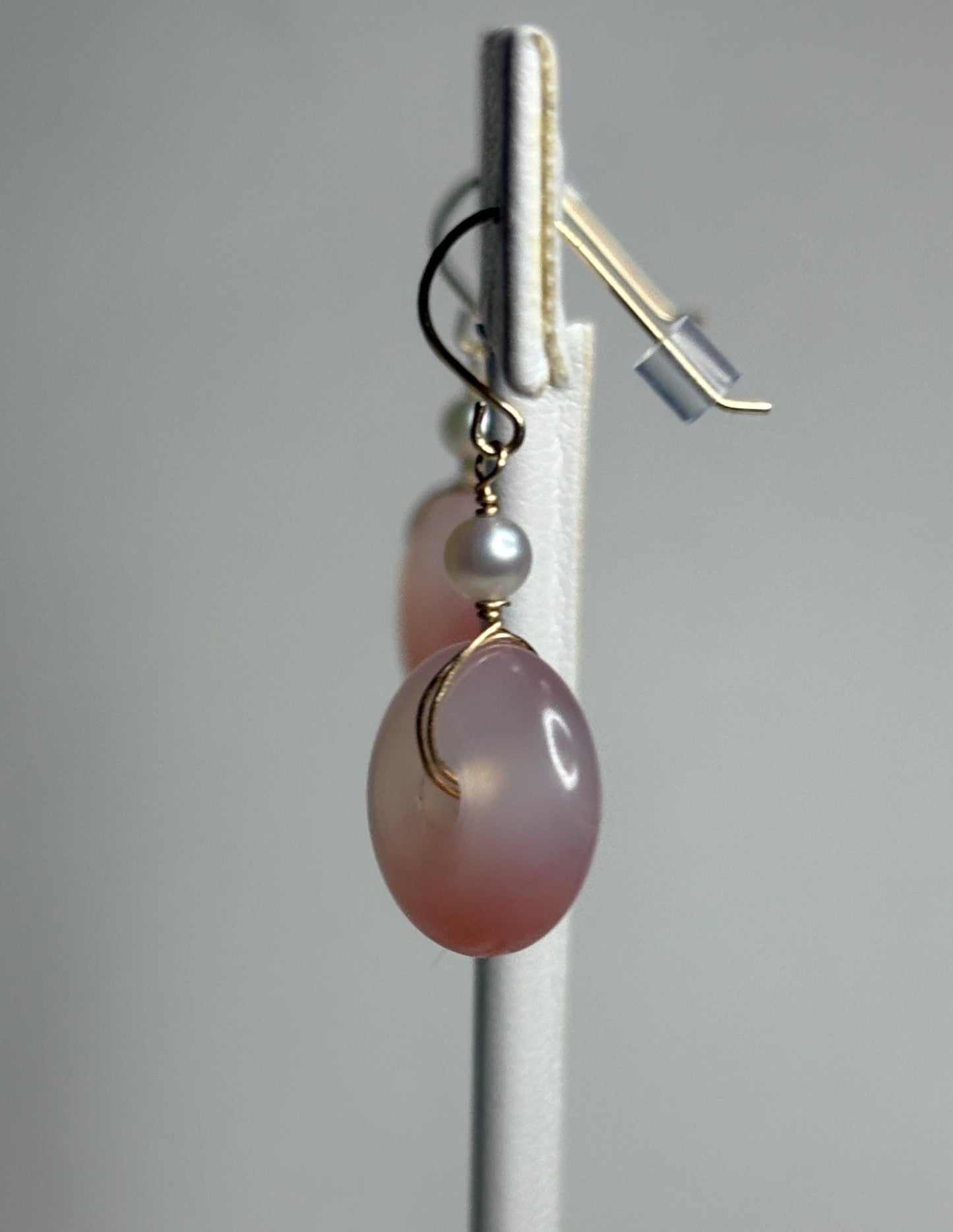 14k gold dangle earrings with pink ombre agate donuts and Akoya pearls.
