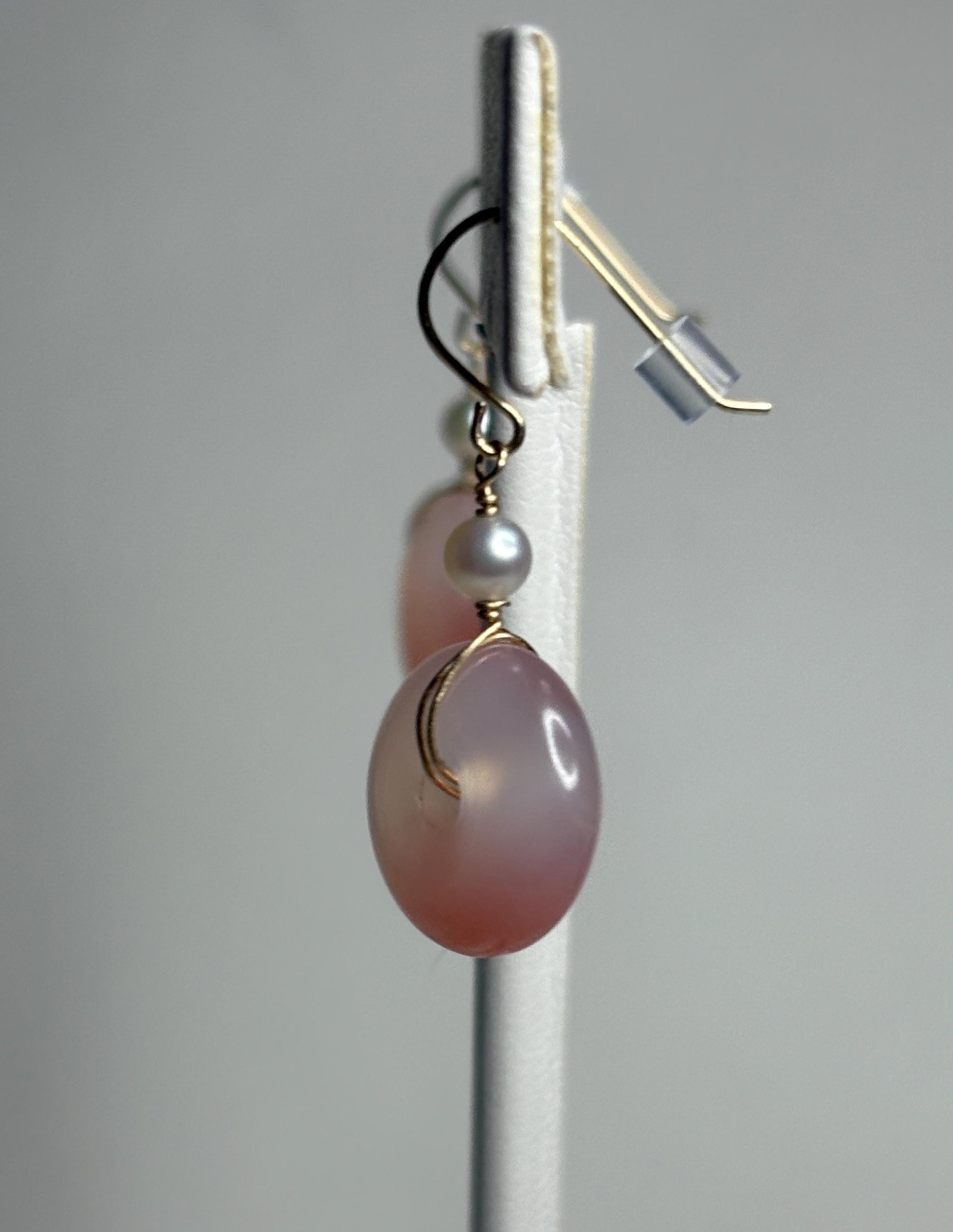 14k gold dangle earrings with pink ombre agate donuts and Akoya pearls.