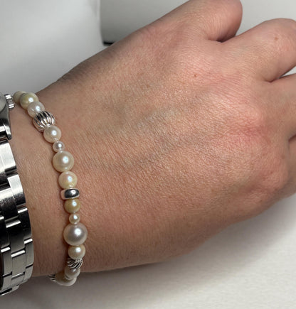 Vintage Akoya pearl stretch bracelet with sterling silver accents.