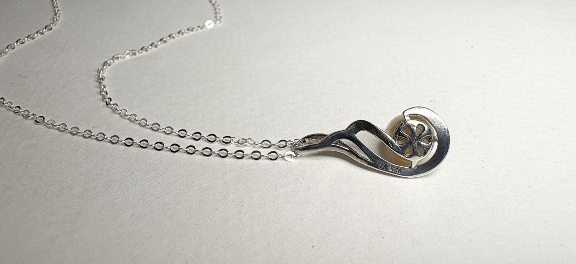 Sterling silver necklace with an 8mm Akoya cultured pearl pendant.