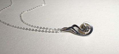 Sterling silver necklace with an 8mm Akoya cultured pearl pendant.