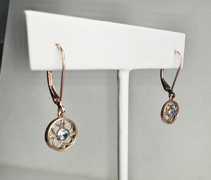 Montana sapphire dangle drop earrings in solid 14k rose gold with lever backs.