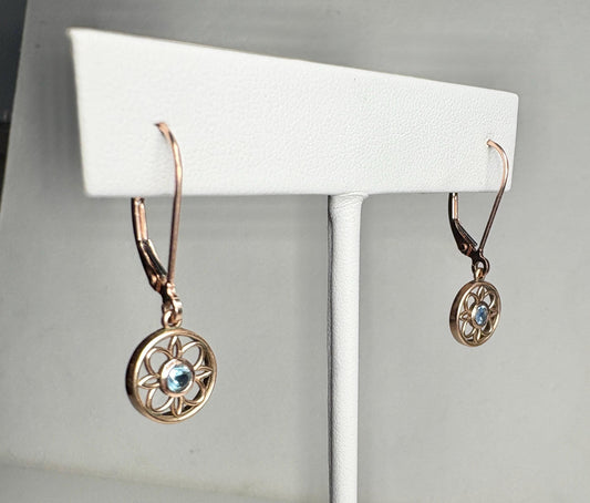 Montana sapphire dangle drop earrings in solid 14k rose gold with lever backs.