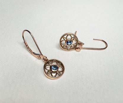 Montana sapphire dangle drop earrings in solid 14k rose gold with lever backs.