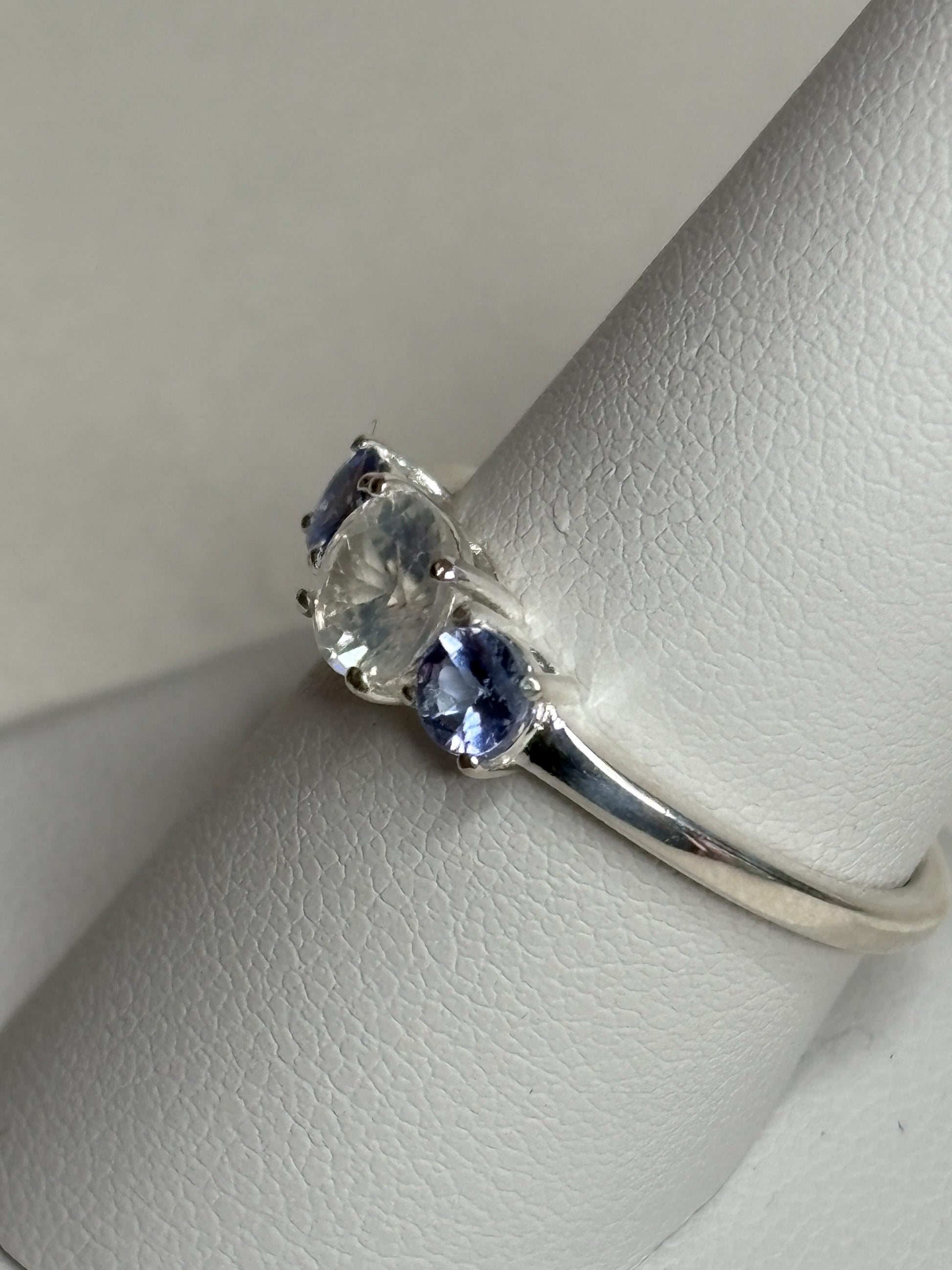 Sterling silver ring with a natural zircon and two tanzanite stones.