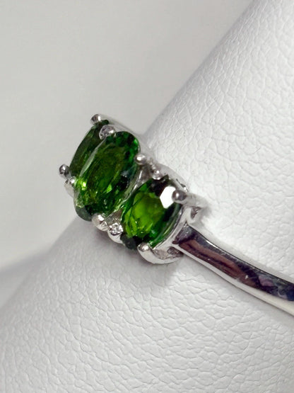 Sterling silver ring with three oval chrome diopside stones.