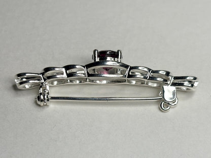 Rhodolite garnet Celtic knot bar brooch in solid sterling silver.