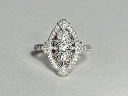 Art Deco revival navette ring in 14k white gold with diamonds.