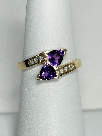 Amethyst trillion bypass ring with diamonds in solid 10k gold.