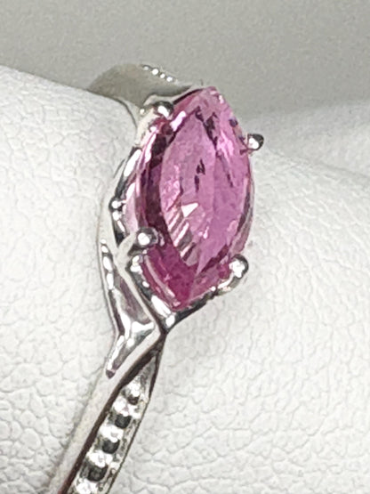 Sterling silver ring with a rose-cut marquise pink sapphire set east-west.