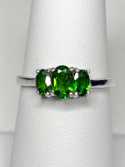 Sterling silver ring with three oval chrome diopside stones.