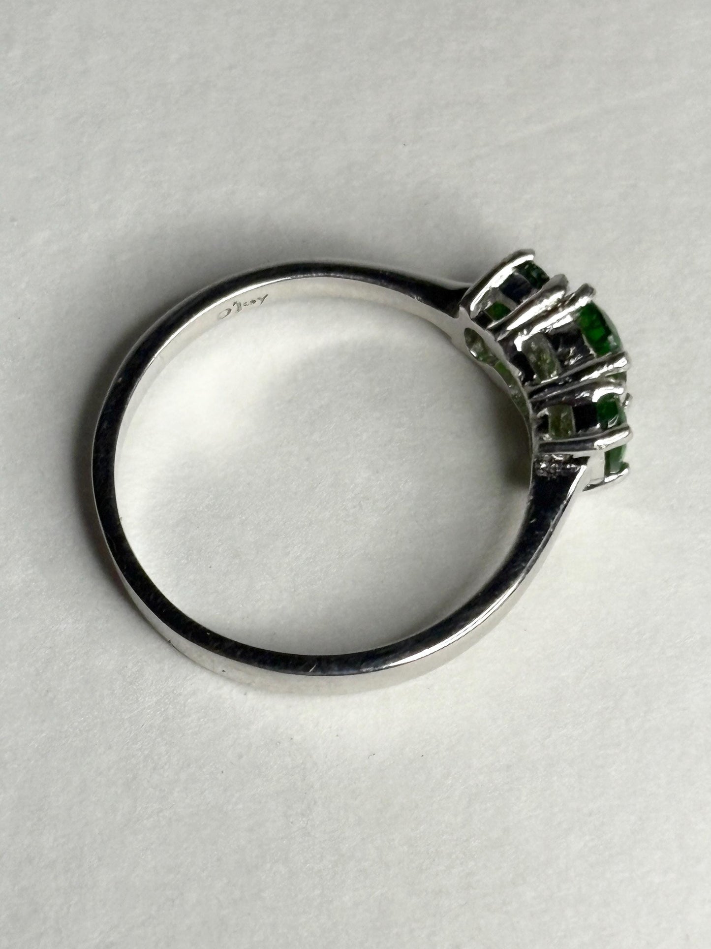 Sterling silver ring with three green chrome diopside stones.