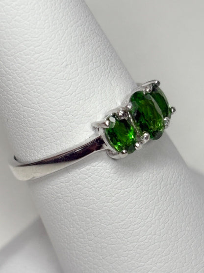 Sterling silver ring with three oval chrome diopside stones.