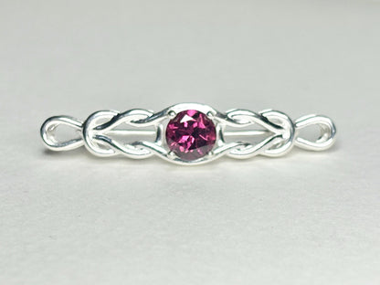 Rhodolite garnet Celtic knot bar brooch in sterling silver.