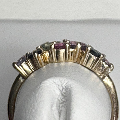 A 10k gold ring with multiple colored sapphires.
