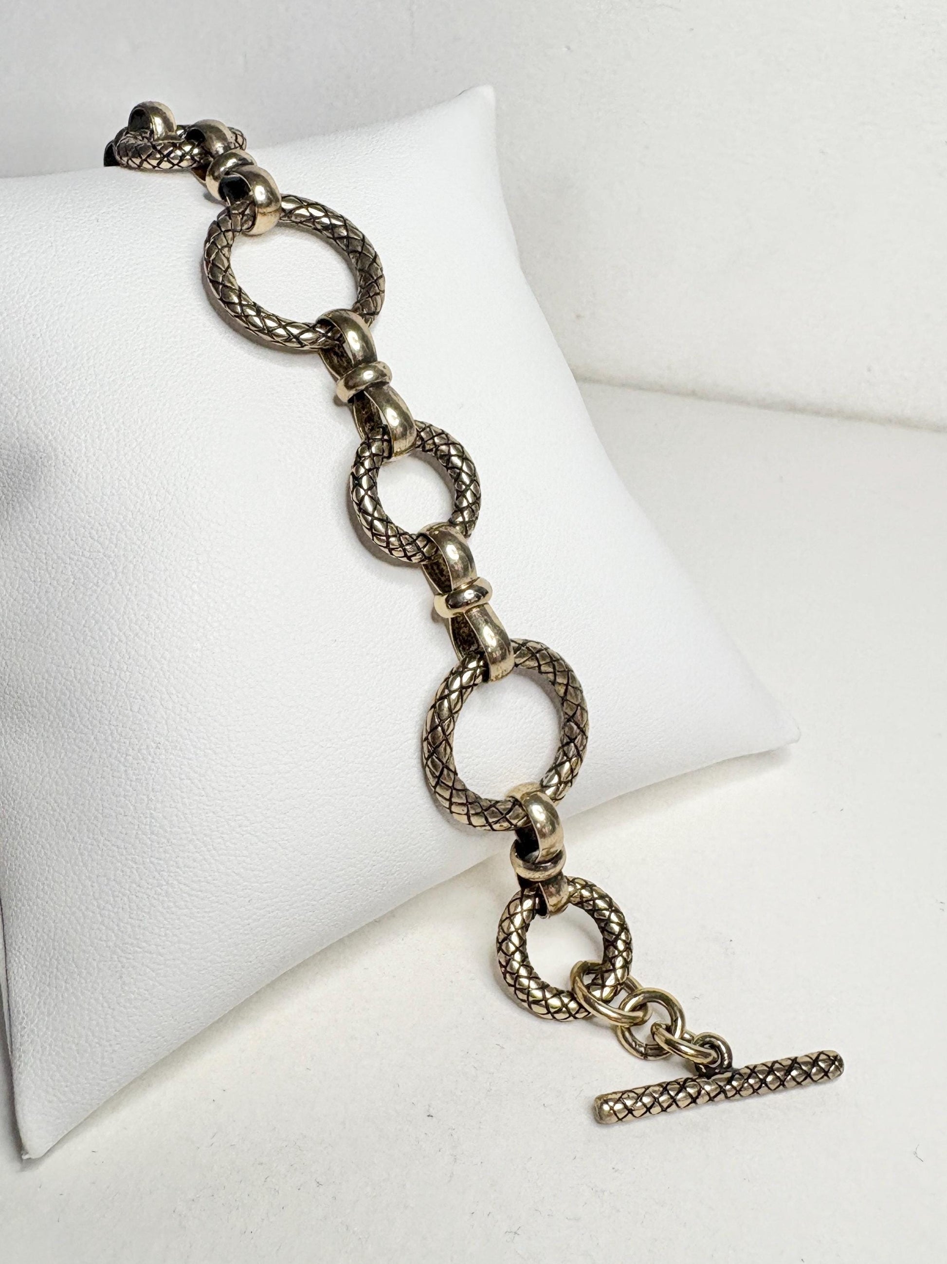 Vintage solid bronze adjustable link bracelet with toggle clasp.
