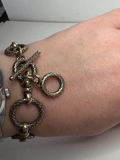 Vintage solid bronze adjustable link bracelet with toggle clasp.