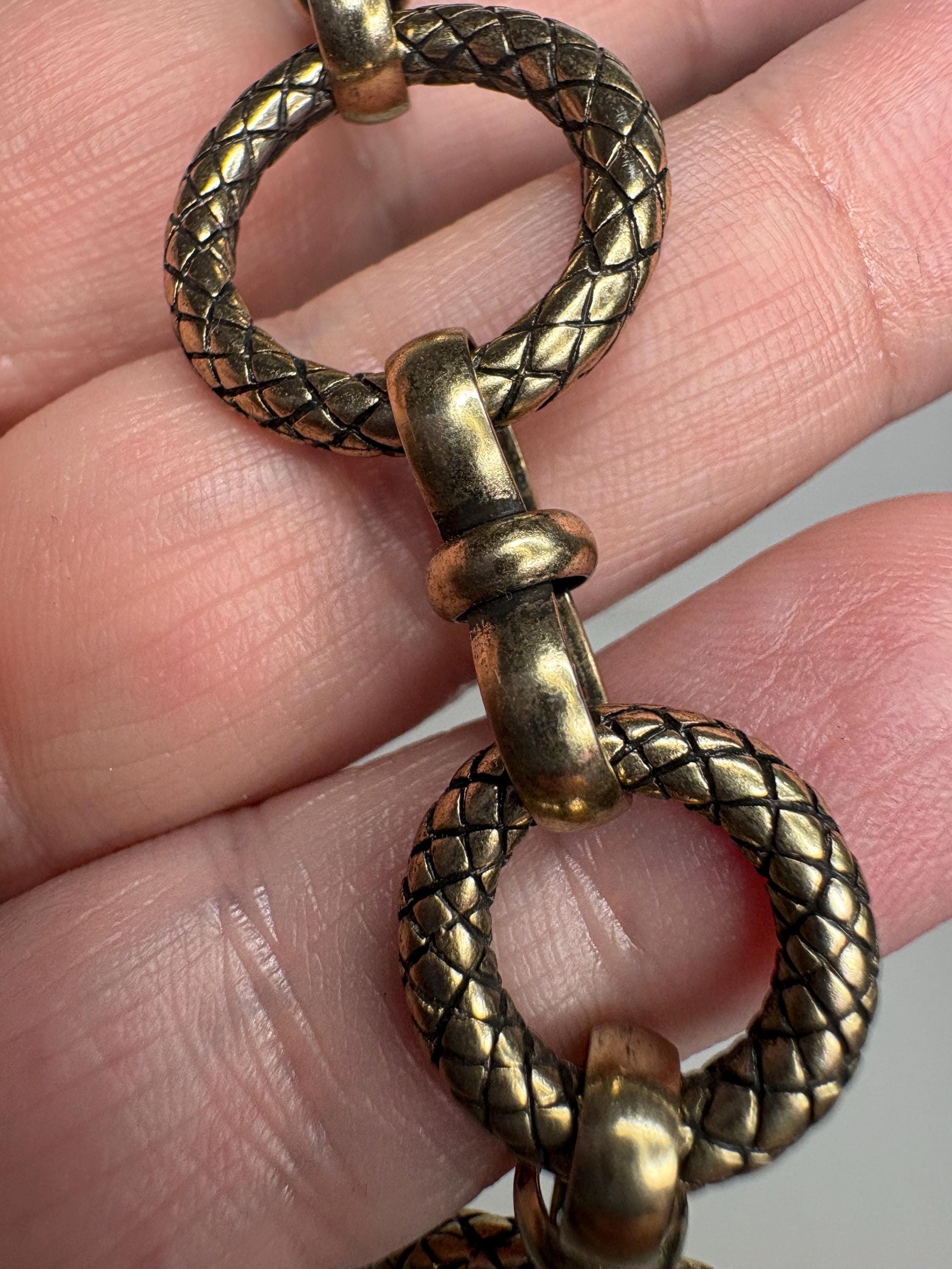 Vintage solid bronze adjustable link bracelet with toggle clasp.