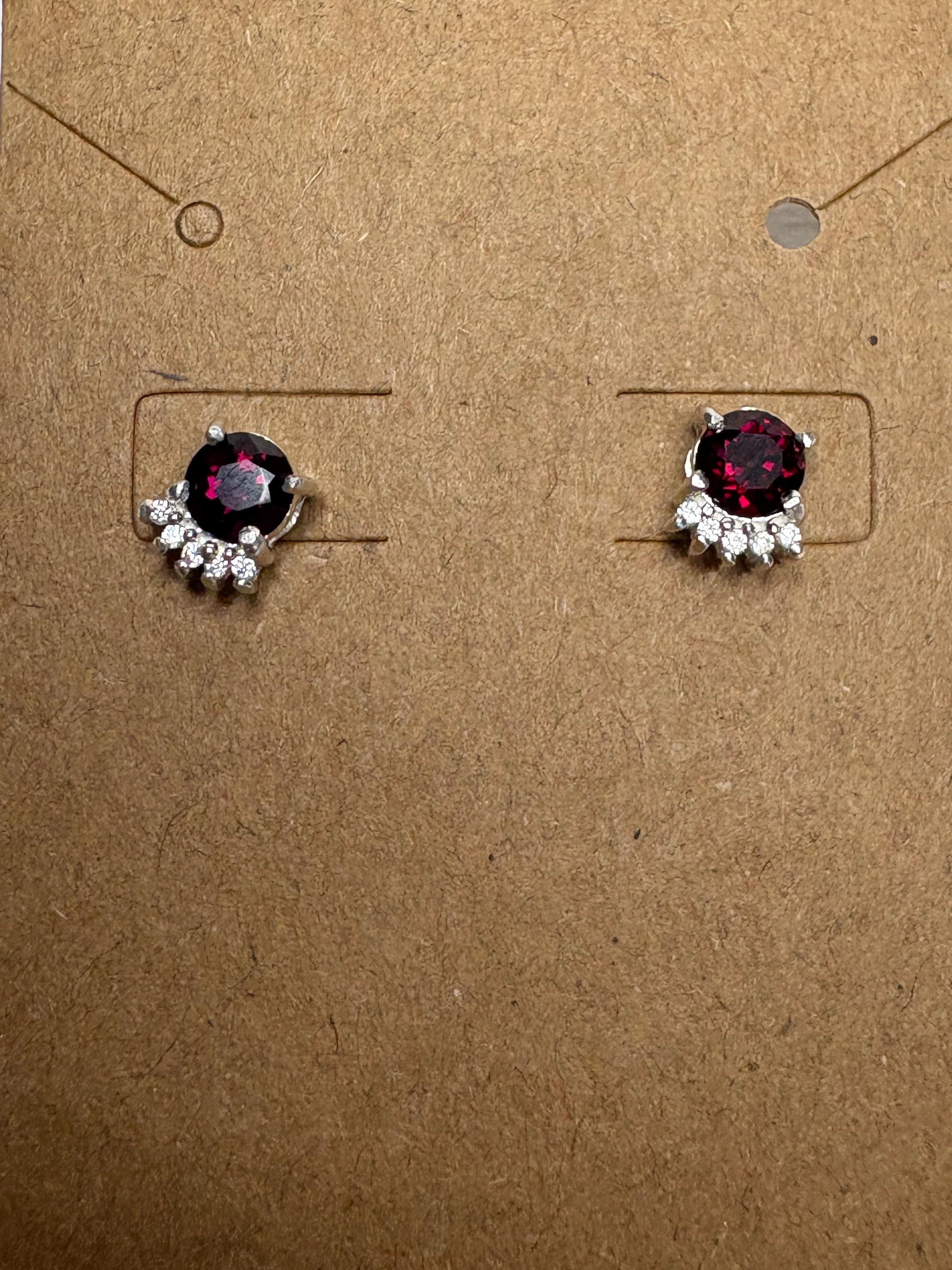 Arizona Anthill garnet and zircon stud earrings in sterling silver.