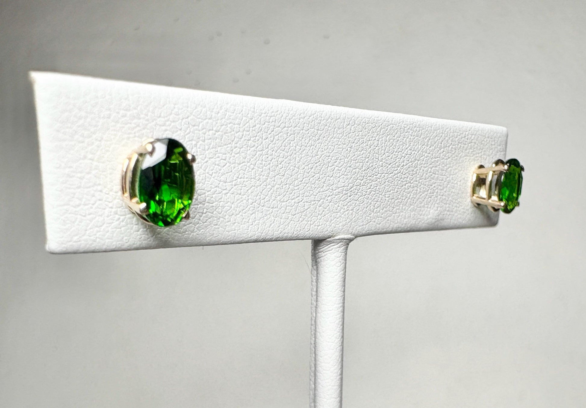Chrome diopside oval stud earrings in 14k gold.