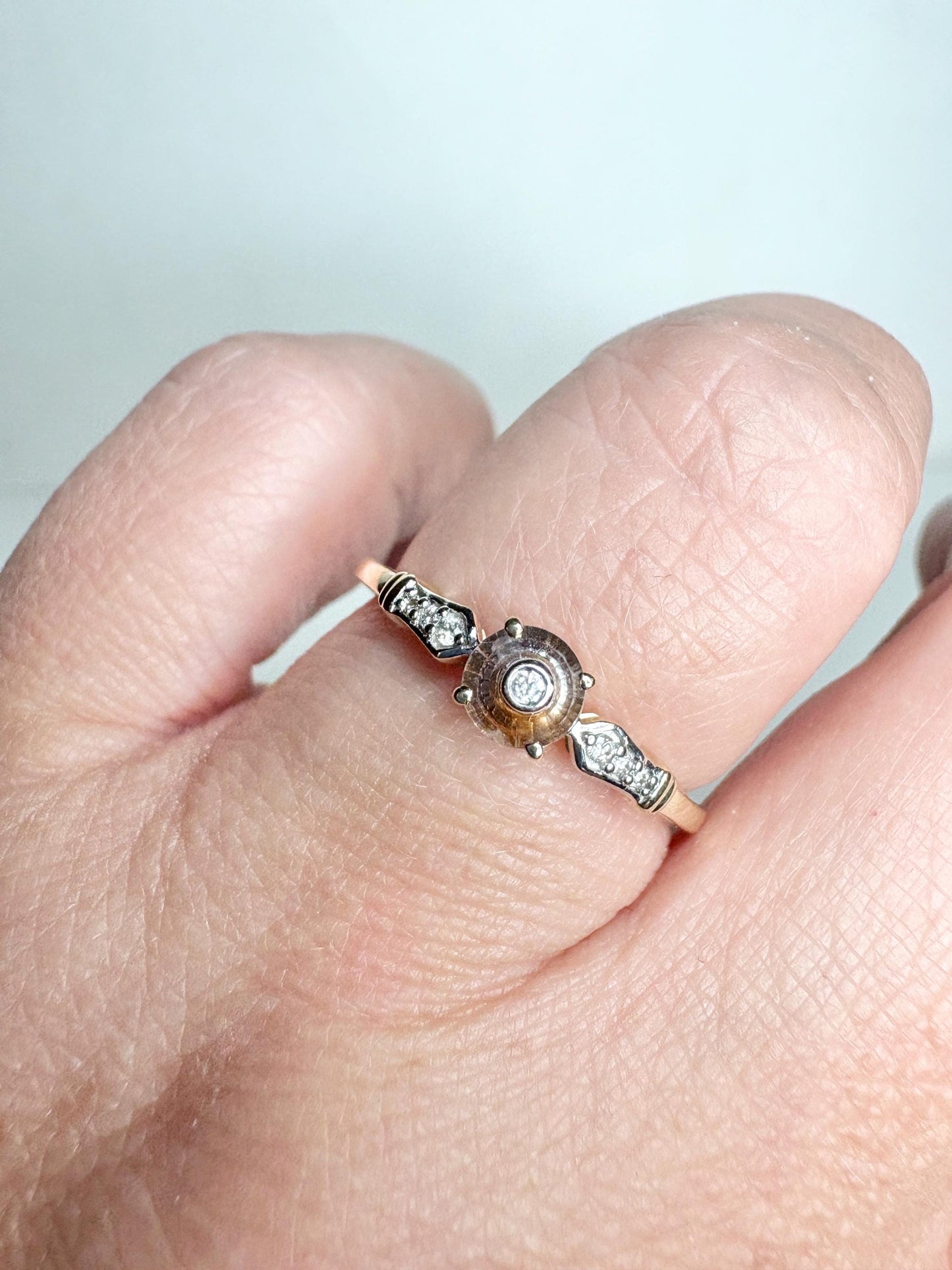A 9k gold ring with a Montana sapphire and diamonds.