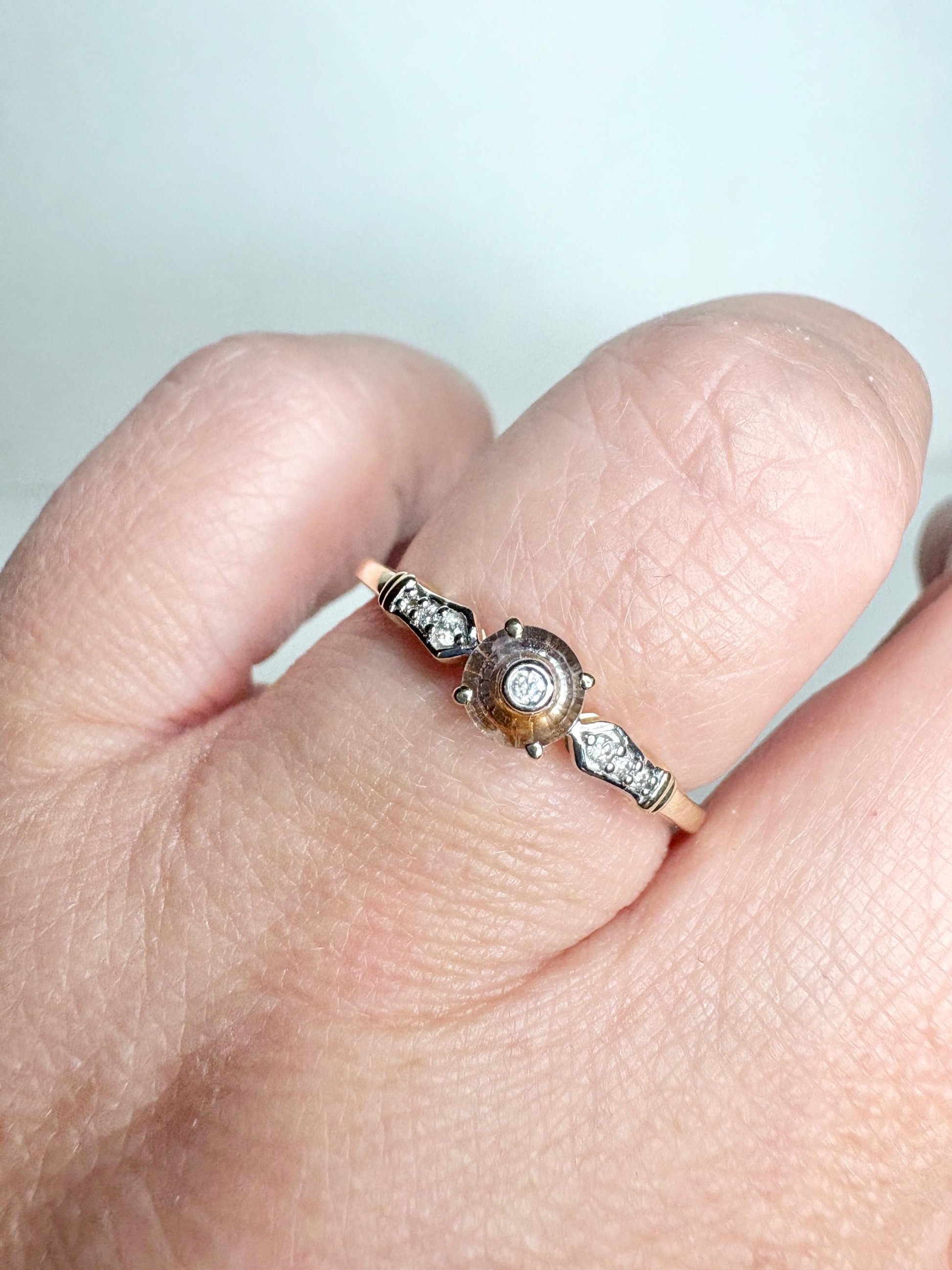 A 9k gold ring with a Montana sapphire and diamonds.