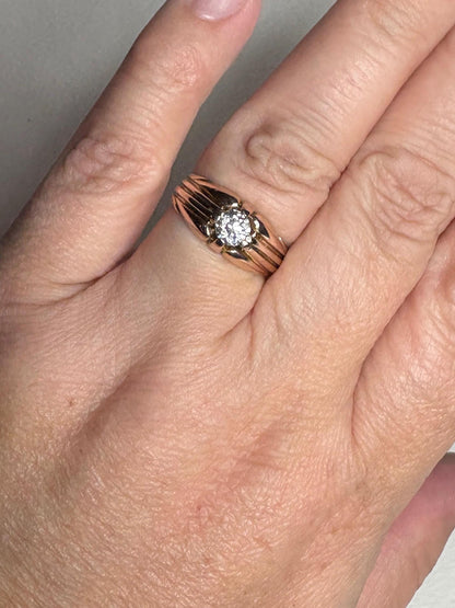 Vintage 10k rose gold ring with an old mine cut diamond.