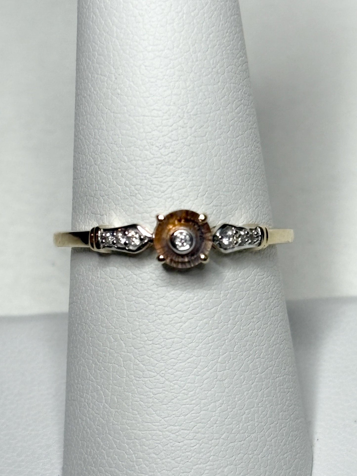 A Montana sapphire Lehrer cut ring with diamonds in 9k gold.