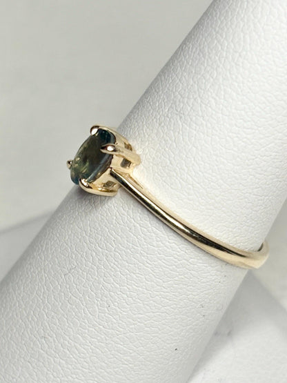 Oval alexandrite chrysoberyl solitaire ring in 10k gold.
