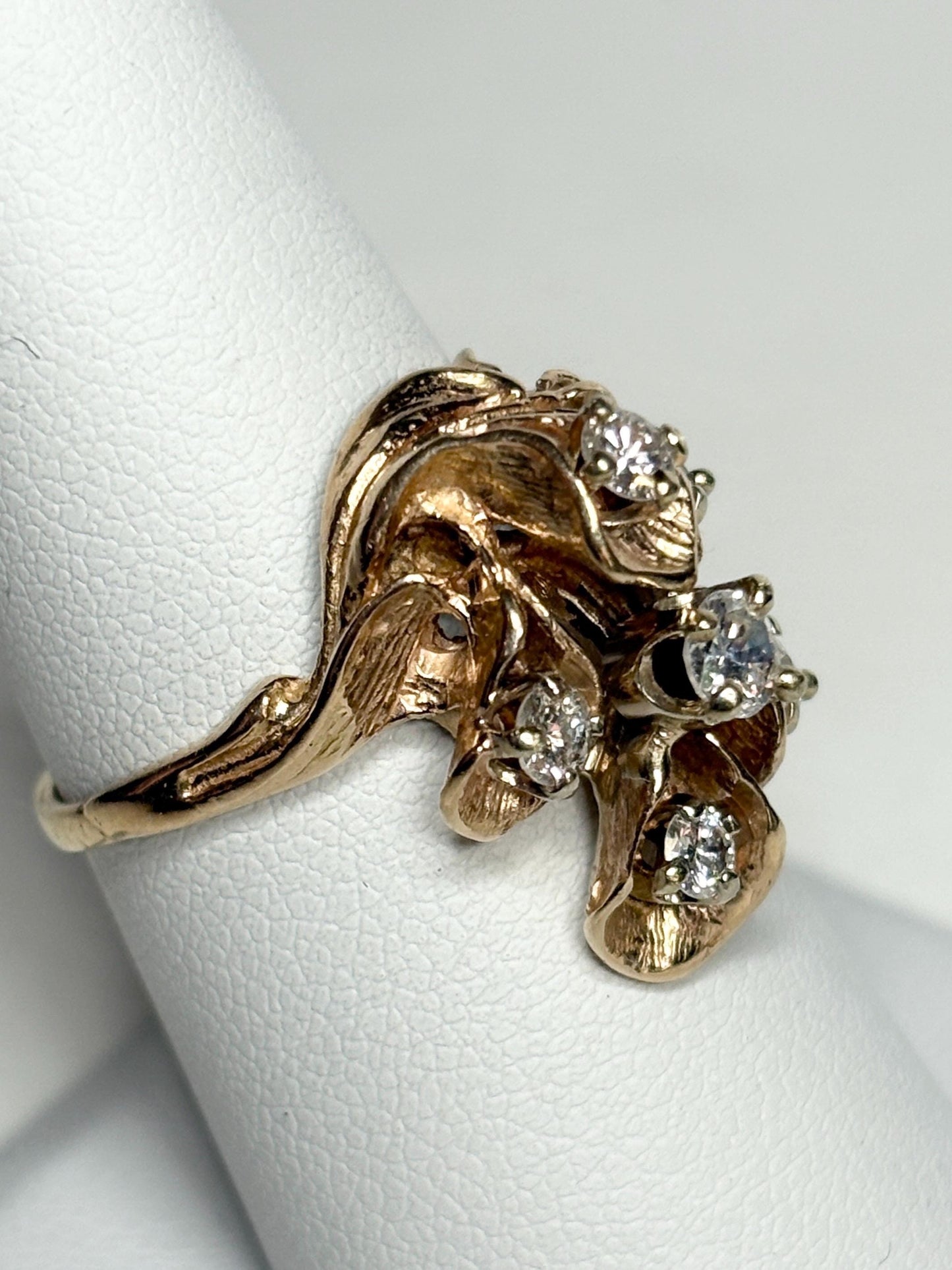 Mid Century 14k gold ring with cascading floral lilies and .75ctw diamonds.