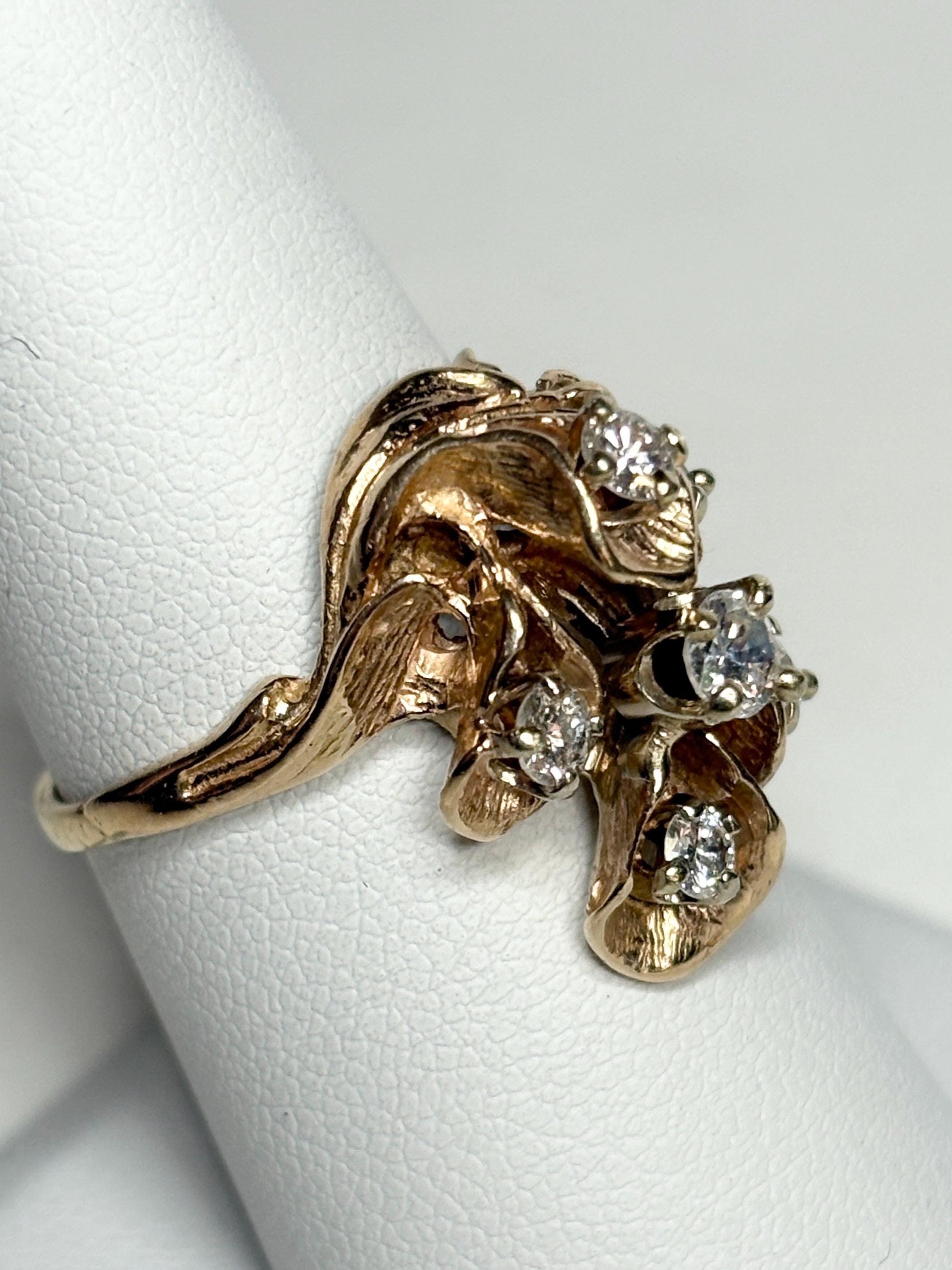 Mid Century 14k gold ring with cascading floral lilies and .75ctw diamonds.