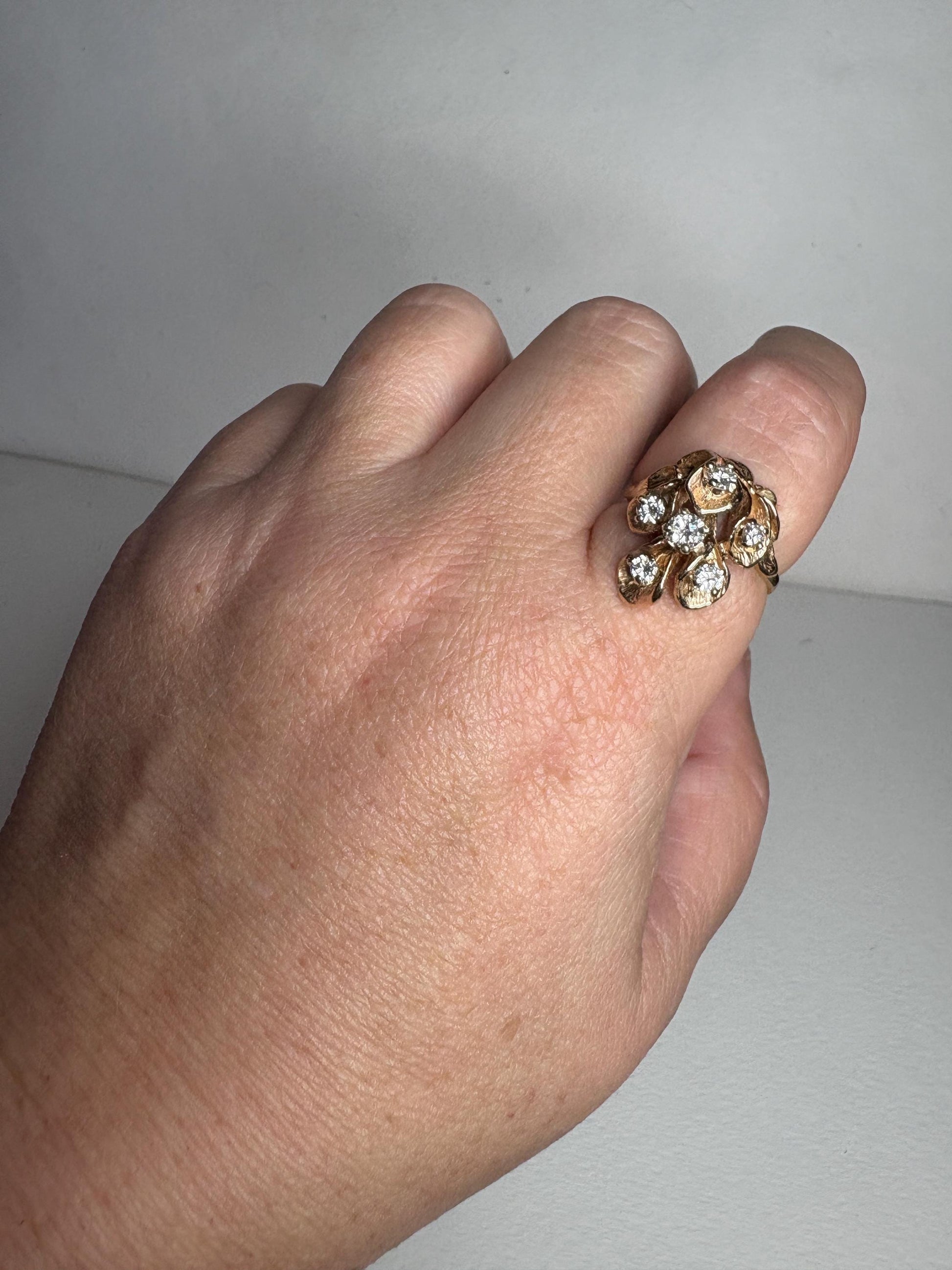 Mid Century 14k gold cocktail ring with cascading floral lilies and .75ctw diamonds.